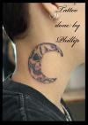 moon and scull tattoo on neck